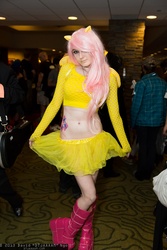 Size: 1365x2048 | Tagged: safe, artist:dtjaaaam, fluttershy, human, g4, belly button, boots, clothes, convention, cosplay, irl, irl human, midriff, nan desu kan, nan desu kan 2013, ndk, photo, skirt, solo