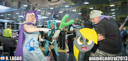 Size: 2048x977 | Tagged: safe, artist:rladao, artist:unkcos22, derpy hooves, trixie, human, g4, anime central, anime central 2013, clothes, convention, cosplay, crossover, gloves, hatsune miku, irl, irl human, leek, photo, shield, vocaloid, wand