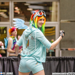 Size: 2048x2048 | Tagged: safe, artist:peachypossum, rainbow dash, human, g4, anime central, anime central 2013, clothes, cosplay, fingerless gloves, gloves, goggles, irl, irl human, photo, shorts, solo