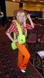 Size: 572x1018 | Tagged: artist needed, safe, applejack, human, g4, chaps, cosplay, irl, irl human, midwestria, midwestria 2012, photo, solo