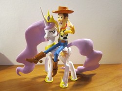Size: 980x735 | Tagged: safe, princess celestia, princess molestia, g4, crossover, customized toy, figure, hentai woody, irl, male, photo, riding, sculpture, tongue out, woody