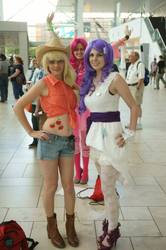 Size: 681x1024 | Tagged: safe, applejack, pinkie pie, rarity, human, g4, belly button, cosplay, irl, irl human, photo