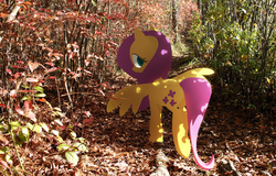 Size: 1024x655 | Tagged: safe, artist:dawnfire, fluttershy, g4, colored pupils, forest, irl, looking at you, looking back, looking back at you, photo, ponies in real life, wood