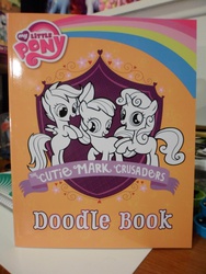 Size: 3456x4608 | Tagged: safe, apple bloom, scootaloo, sweetie belle, g4, book, cutie mark crusaders, doodle, irl, logo, merchandise, photo