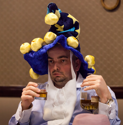 Size: 1573x1600 | Tagged: safe, artist:lupinia, star swirl the bearded, human, g4, alcohol, convention, cosplay, drink, food, irl, irl human, nightmare nights 2013, nightmare nights dallas, peter new, photo, solo, whiskey