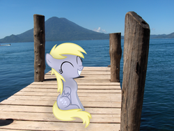 Size: 2304x1728 | Tagged: dead source, safe, artist:anevilzebra, artist:missbeigepony, derpy hooves, g4, boat, cloud, cute, eyes closed, female, filly, grin, irl, mountain, ocean, photo, pier, ponies in real life, sitting, sky, smiling, solo, vector, water