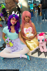 Size: 1365x2048 | Tagged: artist needed, safe, fluttershy, rarity, spike, human, g4, build-a-bear, comikaze expo, comikaze expo 2013, cosplay, glasses, irl, irl human, photo, plushie, spike plushie