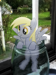 Size: 500x667 | Tagged: safe, artist:diablo, derpy hooves, pegasus, pony, g4, female, irl, jar, mare, micro, photo, ponies in real life, scrunchy face, solo
