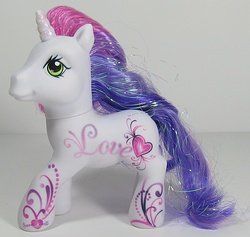 Size: 633x600 | Tagged: safe, photographer:breyer600, sweetie belle (g3), g3, 25th anniversary, heart, irl, love, photo, solo, toy