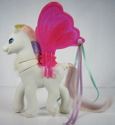 Size: 527x574 | Tagged: safe, photographer:woosie, dainty dove (g2), pony, g2, artificial wings, augmented, female, magic, magic motion, magic wings, mare, toy, wings