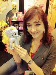 Size: 774x1032 | Tagged: safe, derpy hooves, human, pegasus, pony, g4, fashion style, female, irl, irl human, lauren faust, mare, photo, toy