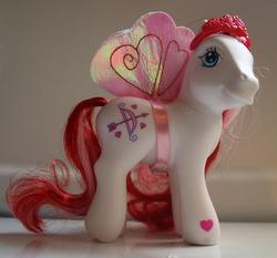Size: 750x699 | Tagged: safe, photographer:lilcricketnoise, always and forever, pony, g3, cupid, cute, happy, irl, photo, smiling, solo, toy, valentine's day, wings