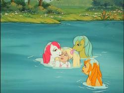 Size: 640x480 | Tagged: safe, screencap, molly williams, ripple (g1), sea shimmer, sun shower, g1, my little pony 'n friends, baby sea ponies, bedroom eyes, hug, water, wet, wet mane
