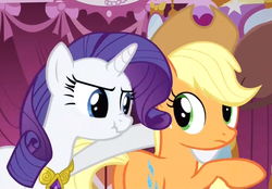 Size: 1131x788 | Tagged: safe, screencap, applejack, rarity, pony, g4, magical mystery cure, scrunchy face, swapped cutie marks