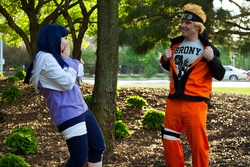 Size: 5236x3491 | Tagged: safe, artist:gekko-chou, human, brony shirt, cosplay, duo, hyuuga hinata, irl, irl human, naruhina, naruto, photo, uzumaki naruto