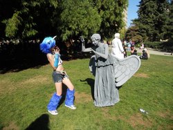 Size: 960x720 | Tagged: safe, artist:romtorum5ever, dj pon-3, vinyl scratch, human, g4, convention, cosplay, crossover, doctor who, irl, irl human, kumoricon, photo, weeping angel