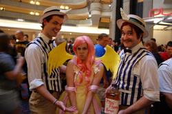 Size: 720x479 | Tagged: artist needed, safe, artist:ayeavast, flam, flim, fluttershy, human, g4, convention, cosplay, dragon con, flim flam brothers, irl, irl human, photo, pouting