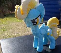 Size: 1600x1402 | Tagged: safe, artist:75redmage, lightning dust, pegasus, pony, g4, doll, folded wings, irl, outdoors, photo, plushie, solo, toy, wings