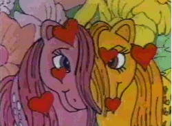 Size: 499x366 | Tagged: safe, artist:ray favata, screencap, butterscotch (g1), cotton candy (g1), earth pony, pony, g1, official, 1982, accidental shipping, animated, commercial, cottoncandybetes, cottonscotch, cute, duo, female, g1 adorascotch, heart, lesbian, looking at each other, shipping, smiling, traditional animation, video at source