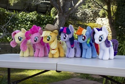 Size: 1000x667 | Tagged: safe, artist:thurinus, applejack, fluttershy, pinkie pie, rainbow dash, rarity, twilight sparkle, earth pony, pegasus, pony, unicorn, g4, collection, irl, mane six, outdoors, photo, plushie, table, unicorn twilight