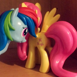 Size: 1166x1166 | Tagged: safe, fluttershy, rainbow dash, pegasus, pony, g4, butt, female, figure, figurine, funko, irl, photo, plot, spread wings, toy, wings