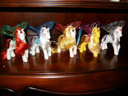 Size: 800x601 | Tagged: safe, copper glow, golden glow, magic diamond glow, princess silver swirl, silver glow (g2), alicorn, pony, unicorn, g2, irl, photo, toy, winged unicorn, wings