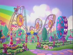 Size: 640x480 | Tagged: safe, screencap, butterfly, g3, positively pink, amusement park, background, butterfly coaster, butterfly island, ferris wheel, park, roller coaster