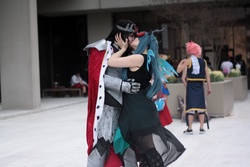 Size: 2816x1880 | Tagged: safe, artist:squibbers, king sombra, queen chrysalis, human, g4, antagonist, convention, cosplay, fairy tail, female, irl, irl human, kissing, male, momocon, natsu dragneel, photo, ship:chrysombra, shipping, straight