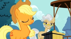 Size: 632x348 | Tagged: safe, screencap, applejack, mayor mare, g4, the last roundup, female, glasses, mayor, out of context, smiling