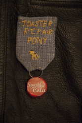 Size: 803x1200 | Tagged: safe, artist:tomcullen, fallout equestria, bottlecap, irl, medal, photo, text, toaster repair pony