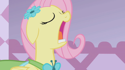 Size: 1280x720 | Tagged: safe, screencap, fluttershy, pony, g4, my little pony: friendship is magic, suited for success, clothes, dress, faic, female, gala dress, solo