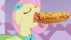 Size: 1280x720 | Tagged: safe, edit, edited screencap, screencap, fluttershy, pegasus, pony, g4, season 1, suited for success, cheese, chili dog, chilli, clothes, dress, eating, female, fluterweeb, food, funny, gala dress, hot dog, mare, meat, ponies eating meat, sausage