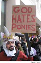 Size: 294x456 | Tagged: safe, human, unicorn, barely pony related, cosplay, irl, irl human, photo, protest, sign, troll