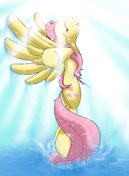 Size: 1237x1681 | Tagged: safe, artist:michinix, fluttershy, pegasus, pony, g4, butt, crepuscular rays, eyes closed, female, mare, open mouth, plot, smiling, solo, sparkles, splash, spread hooves, spread wings, water, wet mane, wings