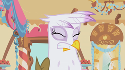 Size: 661x371 | Tagged: safe, screencap, gilda, griffon, g4, griffon the brush off, female, griffon teeth, solo, sugarcube corner, teeth