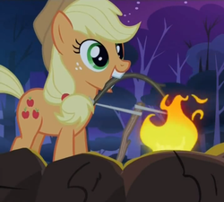 Size: 805x726 | Tagged: safe, screencap, applejack, g4, sleepless in ponyville, bow drill, campfire, fire, happy, mouth hold