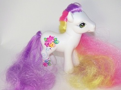 Size: 615x461 | Tagged: safe, photographer:kisscurl, earth pony, pony, g3, female, irl, mare, multicolored hair, photo, rainbow hair, royal beauty, solo, super long hair, toy