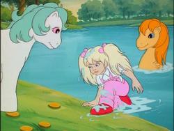 Size: 640x480 | Tagged: safe, screencap, cupcake (g1), molly williams, sun shower, sea pony, g1, my little pony 'n friends, baby sea pony, water, wet, wet hair