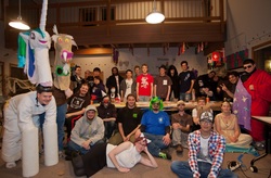 Size: 1272x835 | Tagged: safe, human, brony, cosplay, group photo, irl, irl human, photo, ponysuit, quadsuit, the burdened
