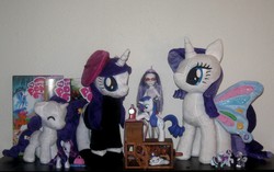 Size: 1436x901 | Tagged: artist needed, safe, idw, rarity, g4, comic book, irl, photo, plushie, raricorn, shrine, toy