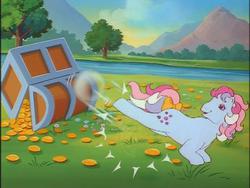 Size: 640x480 | Tagged: safe, screencap, sweet stuff, twinkle eyed pony, g1, my little pony 'n friends, bubble, cute, horses doing horse things, kick, magic coins, stretch, stretching, sweet sweet stuff, treasure chest