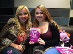 Size: 1024x768 | Tagged: safe, twilight sparkle, human, g4, my little pony chapter books, my little pony: twilight sparkle and the crystal heart spell, book, g.m. berrow, irl, irl human, photo, tara strong, toy