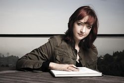 Size: 560x373 | Tagged: safe, human, irl, irl human, lauren faust, notebook, photo, solo