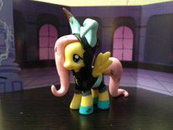 Size: 1500x1125 | Tagged: safe, fluttershy, pegasus, pony, g4, brushable, bunny ears, clothes, customized toy, dangerous mission outfit, female, hoodie, irl, mare, photo, solo, toy