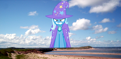 Size: 1000x493 | Tagged: safe, trixie, pony, unicorn, g4, angry, beach, canada, female, giant pony, giant trixie, giant unicorn, giantess, highrise ponies, macro, mare, mega trixie, prince edward island, solo