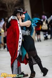 Size: 640x960 | Tagged: safe, artist:squibbers, king sombra, queen chrysalis, human, g4, cosplay, irl, irl human, kissing, momocon, photo, ship:chrysombra, shipping