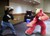 Size: 1968x1424 | Tagged: safe, big macintosh, human, g4, comic con, cosplay, dan, dan vs, fight, fighting stance, fursuit, irl, irl human, phoenix comicon 2013, photo