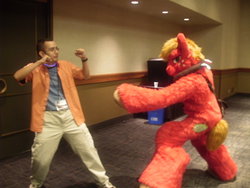 Size: 2048x1536 | Tagged: safe, big macintosh, human, g4, chris, cosplay, dan vs, fighting stance, fursuit, irl, irl human, phoenix comicon 2013, photo