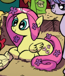 Size: 428x498 | Tagged: safe, edit, idw, official comic, fluttershy, sleepy skies, tofu, pony, g4, micro-series #3, my little pony micro-series, cropped, flower, flower in hair, hippie, hippieshy, prone, smiling, solo focus