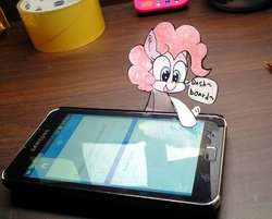 Size: 875x705 | Tagged: safe, artist:danadyu, pinkie pie, earth pony, pony, g4, cellphone, irl, jumped-out-pinkieanswers, paper child, phone, photo, smartphone, speech bubble